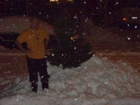 Christmas Tree Outside - can't quite see through the snow