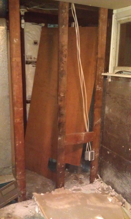 The alcove by the garage door