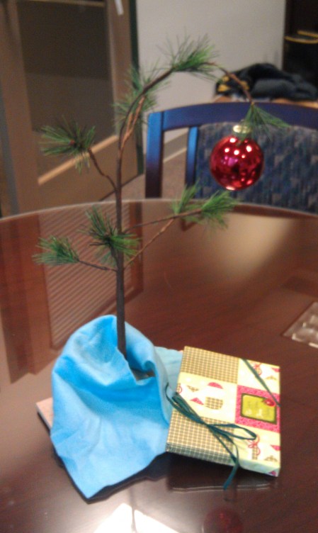 The Charlie Brown Tree in my bosses office