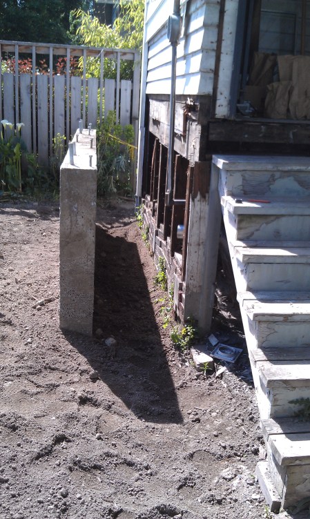 3 yds of concrete (part is now hidden underground)