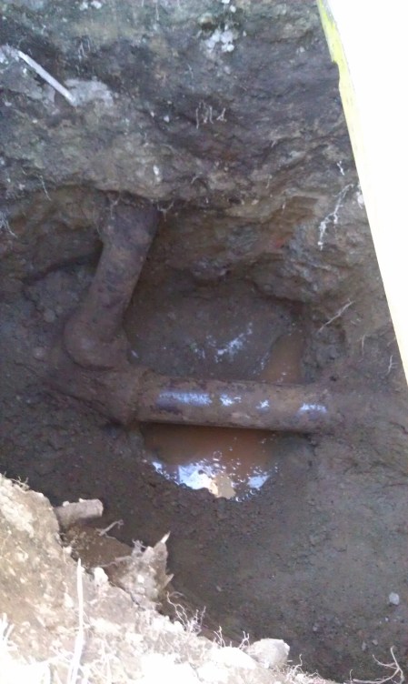 West end of old side sewer (gutter connection going up)