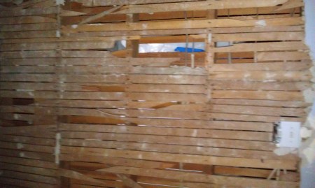 The dining-kitchen wall that will be disappearing (from the dining room side)