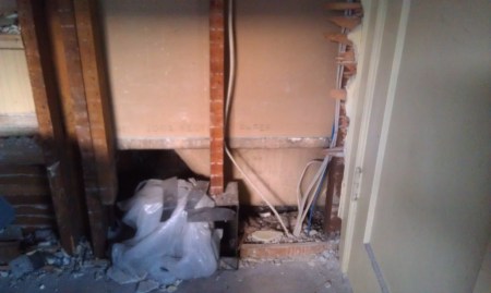 Backside of the bathtub (see the sloped line near the bottom left)