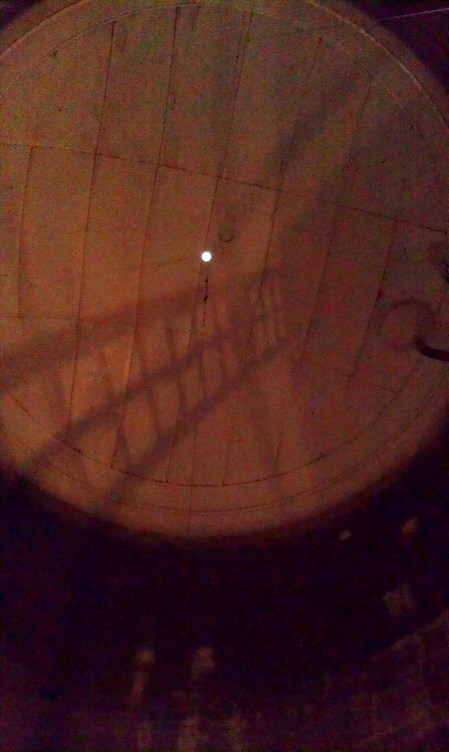 Roof is about 100 feet up. Ladder shadow - overflow funnel on the right