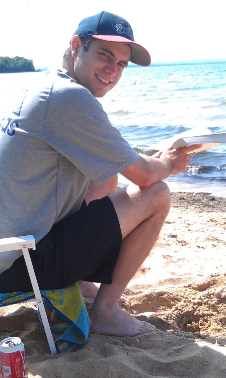 College boy (note he is reading a book)